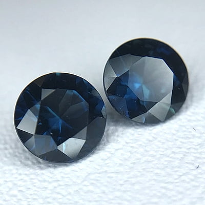 0.81tcw Round Mixed Cut Sapphire Pair