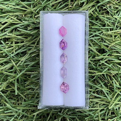 2.27tcw Hexagon Step Cut Sapphire Parcel (5pcs) 2.27tcw Hexagon Step Cut Sapphire Parcel (5pcs)